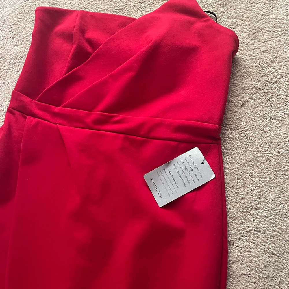 Sophisticated, cocktail dress, asymmetrical, top, and hem. Never worn